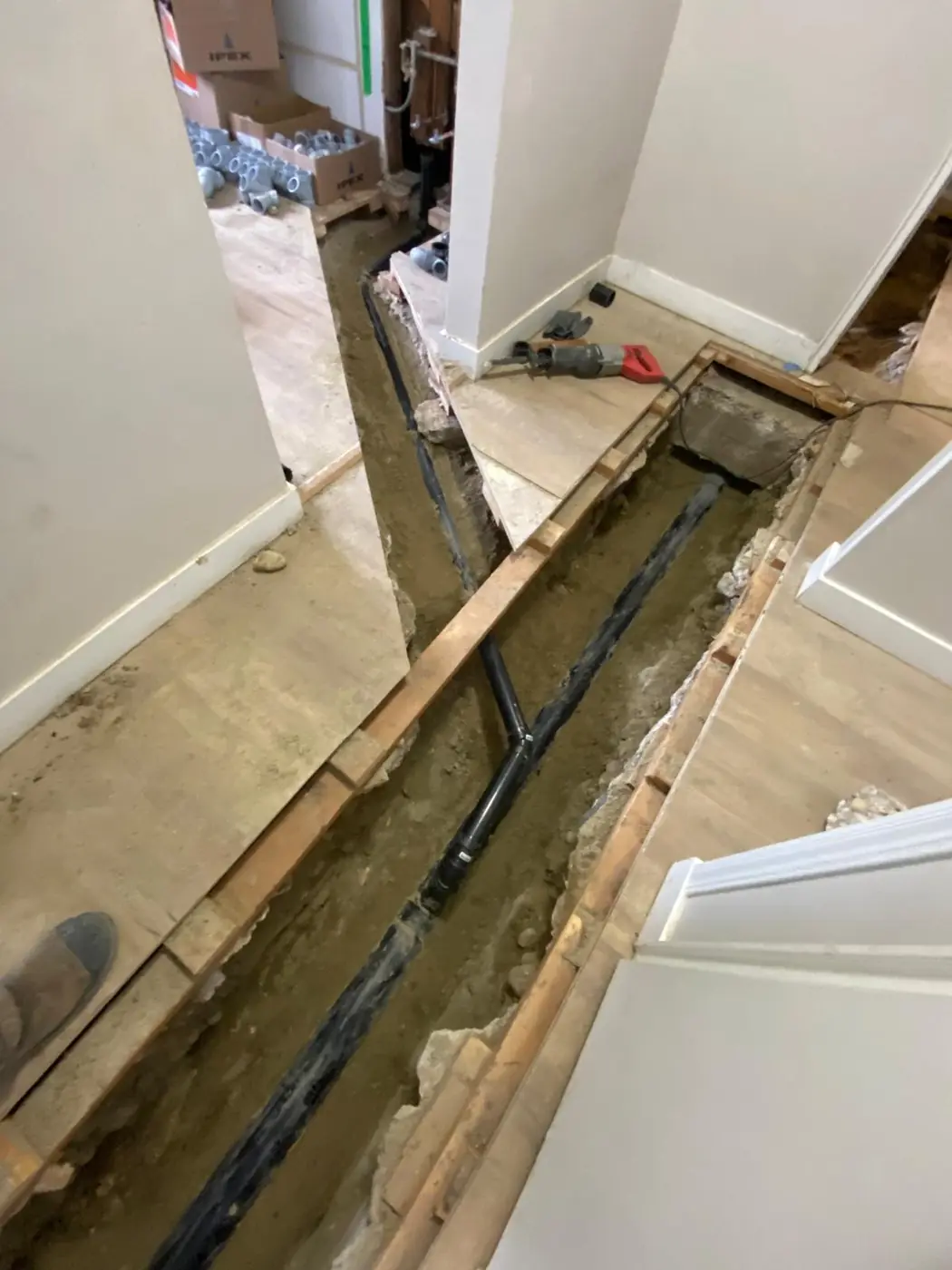 New ABS drain line laid in the trench