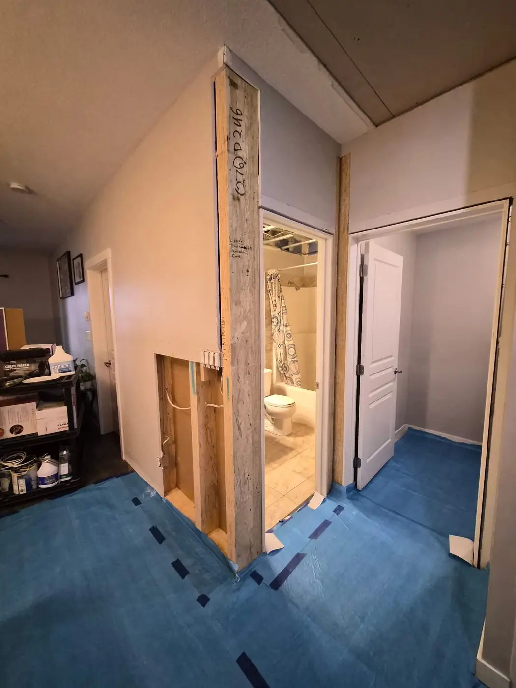 Occupied suite — floors protected during repairs