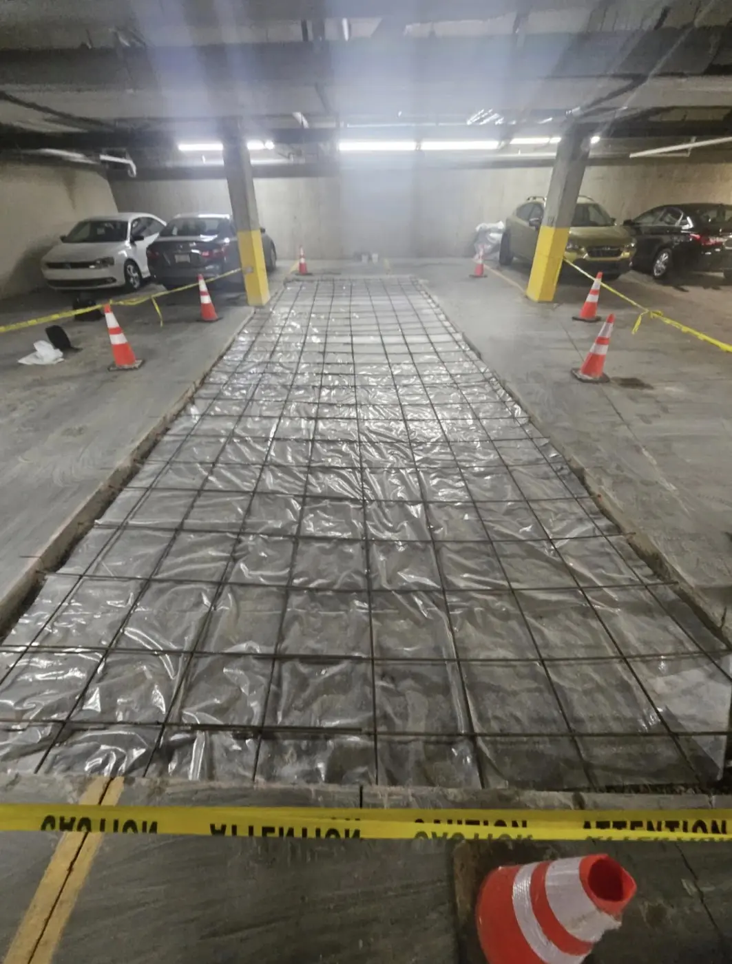 Parkade slab section reinforced and taped off