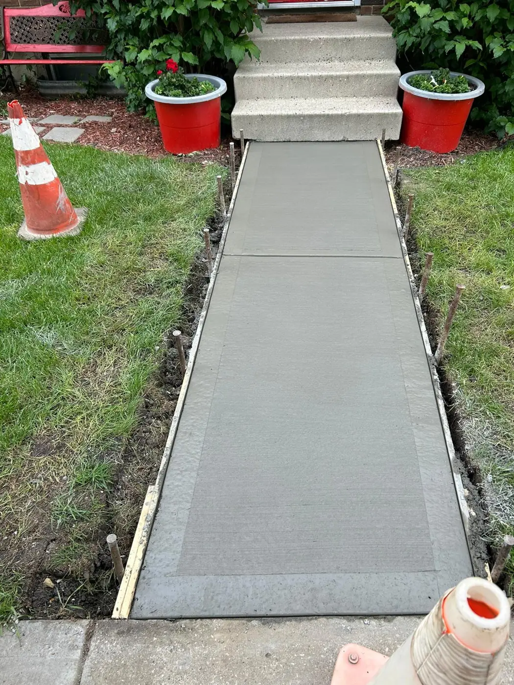 New concrete walkway to the front steps